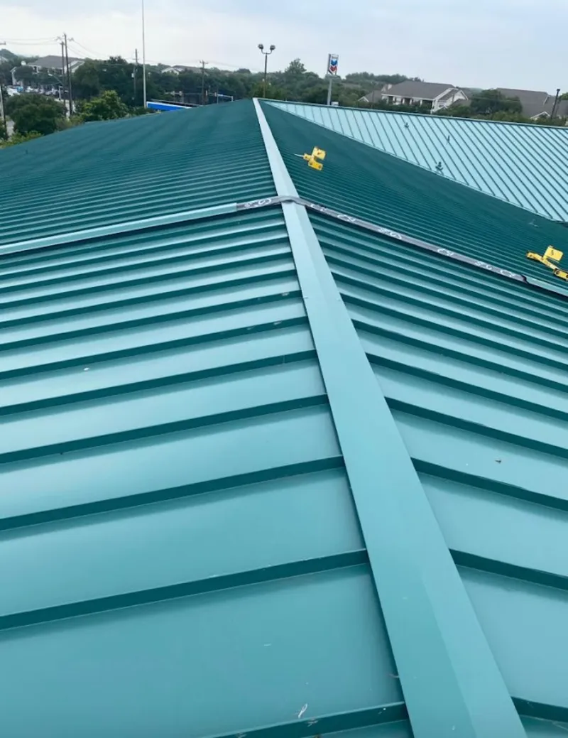 Green commercial metal roof ridge and valley for Metal Roof Repair in Ross